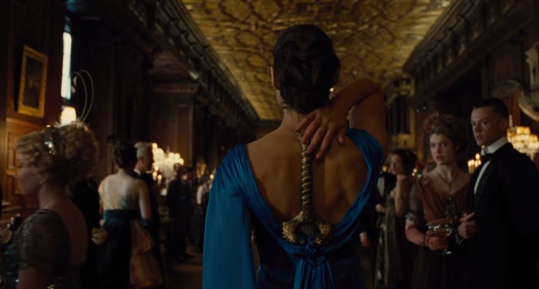 Wonder Woman reaches for her sword