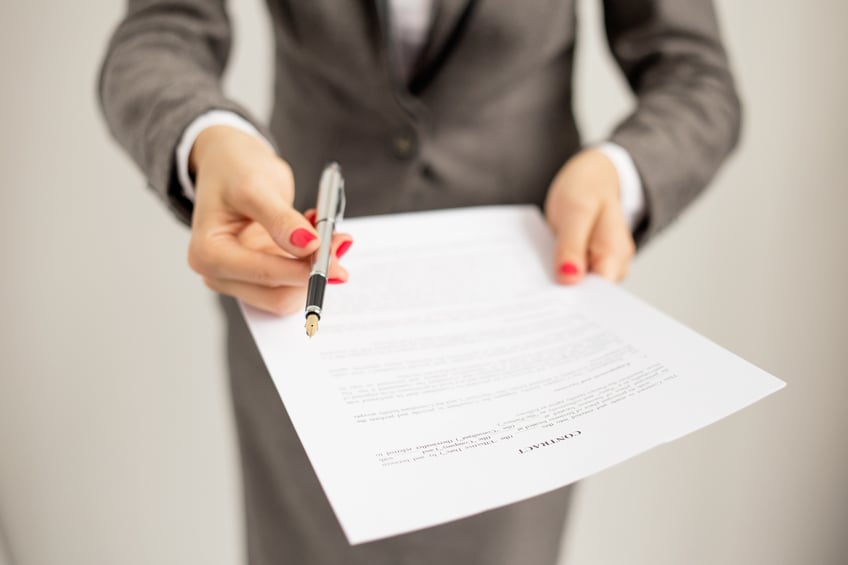 job offer, woman offering a contract and a pen