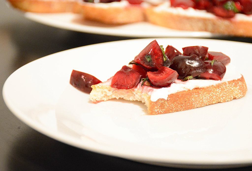 bitten cherry and goat cheese crostino