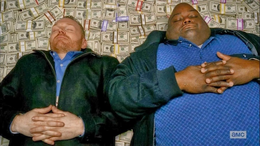 Breaking Bad characters lying on a pile of money.