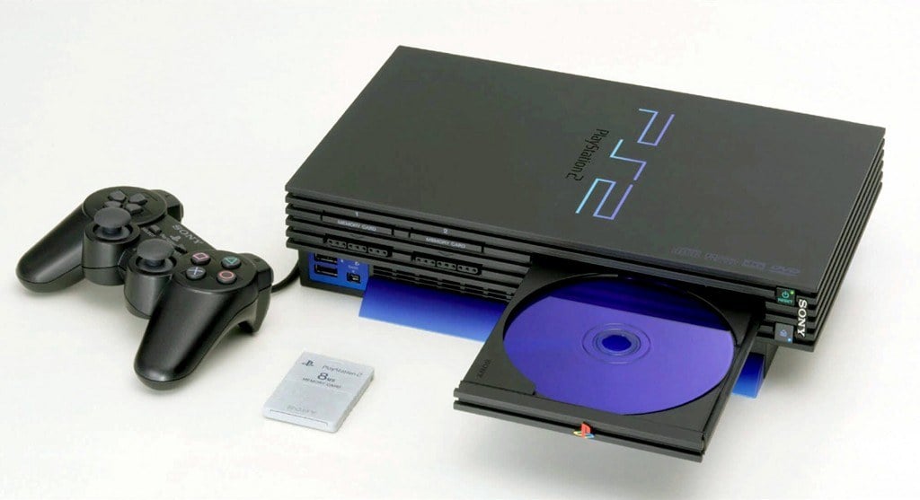 The PlayStation 2, with controller and memory card.