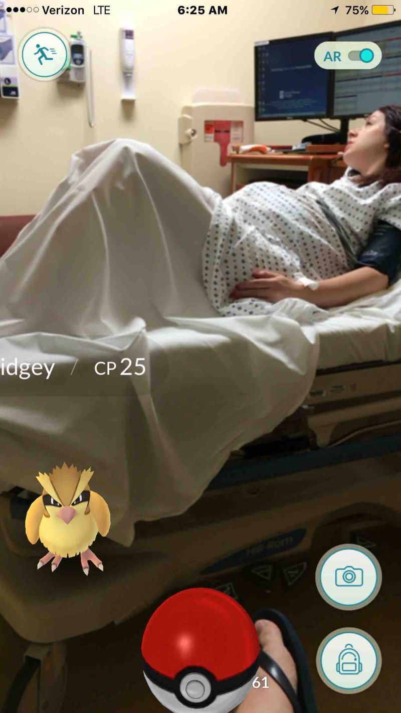 A man plays Pokemon GO while his wife is in labor at the hospital.