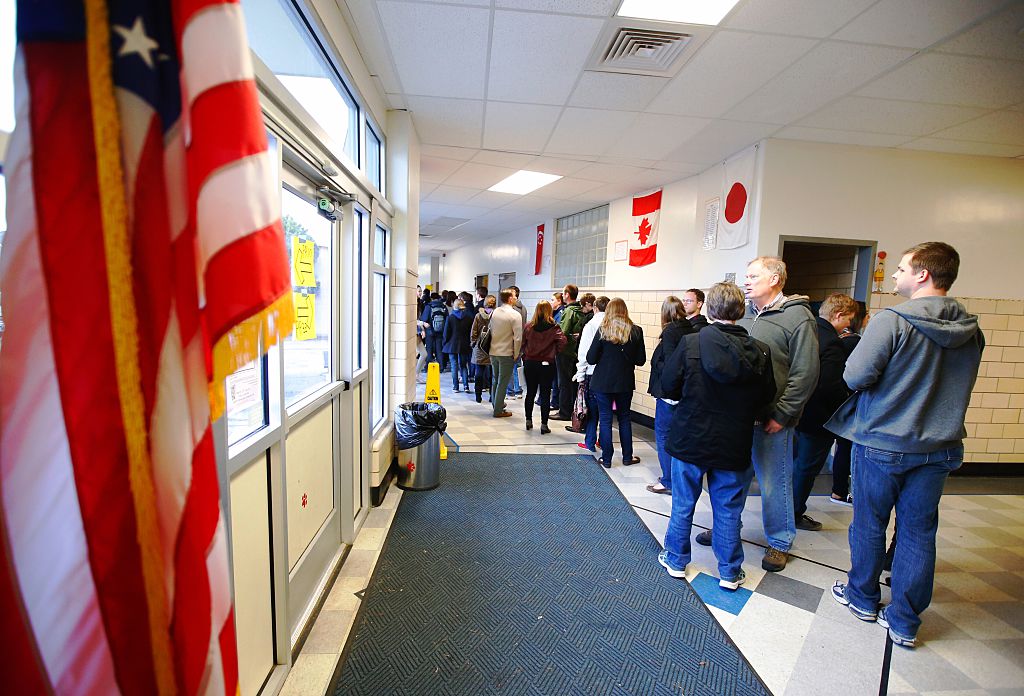 PROVO, UT - MARCH 22: Voters line up to attend the Utah republican caucuses at Wasatch Elementary on March 22, 2016 in Provo, Utah. The Republicans have 40 delegates and Democrats 37 delegates at stake in Utah. (Photo by George Frey/Getty Images)