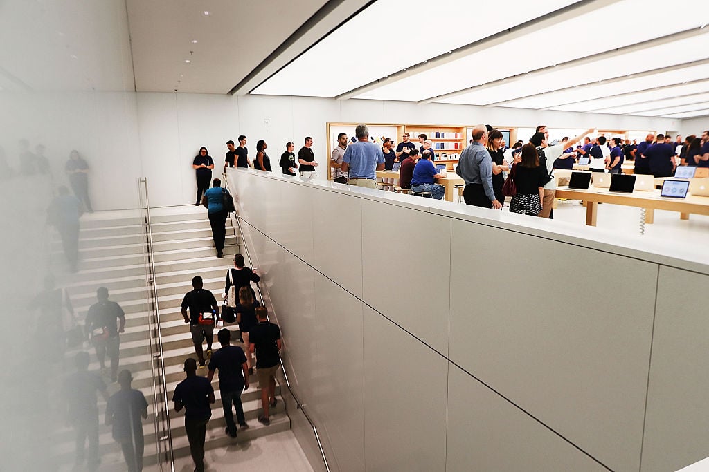 Customers shop at the new Apple Store