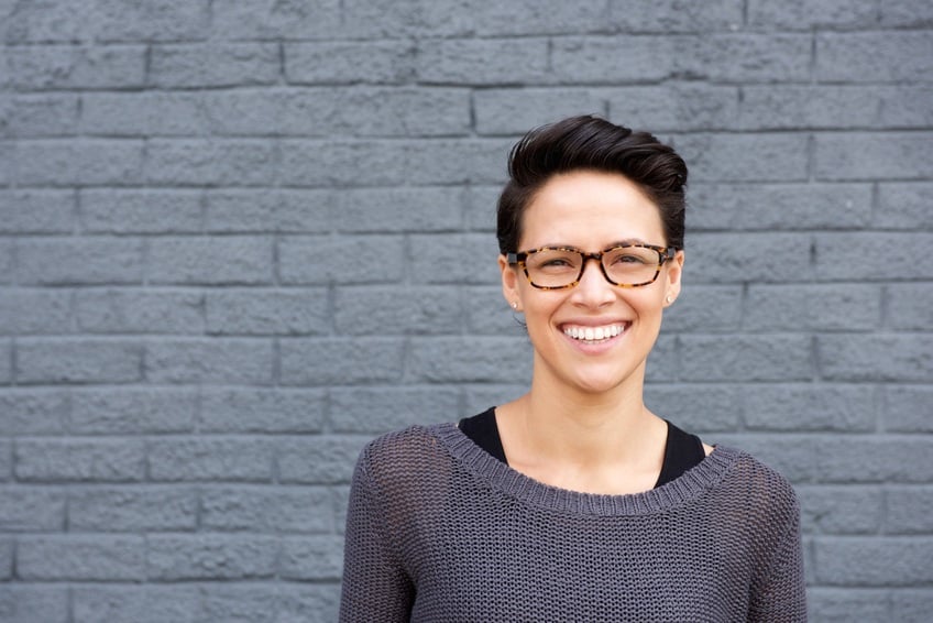 smiling woman wearing glasses