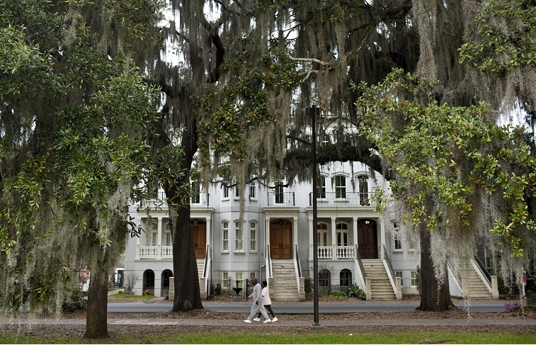 A couple walks along Forsyth Park March 2, 2012 in Savannah, Georgia.