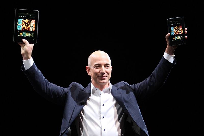 Jeff Bezos holds up the Kindle Fire HD
