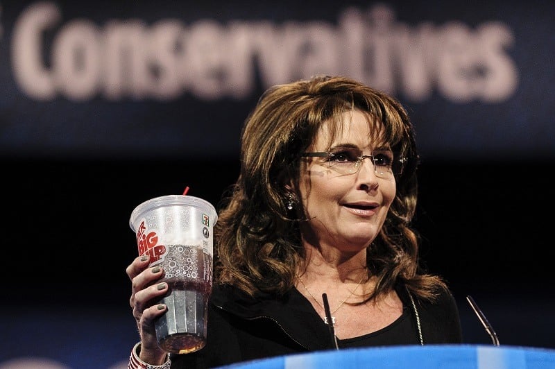 Sarah Palin, former Governor of Alaska, holds up a large soda as she speaks about New York City Mayor Michael Bloomberg's proposed large soda ban and tax in 2013