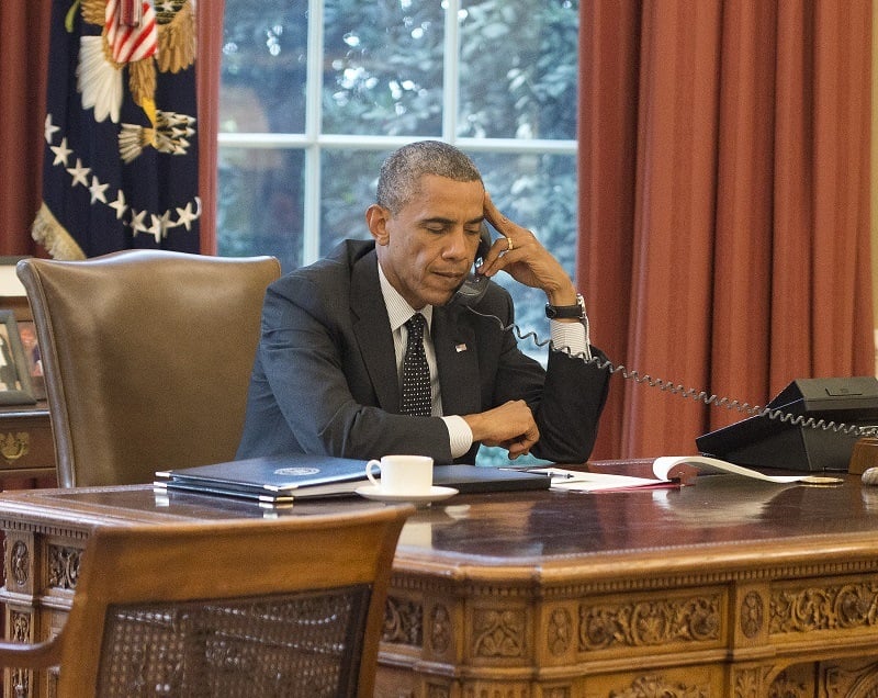 Obama speaks with King Abdullah II of the Hashemite Kingdom of Jordan on the phone from the Oval Office in August 2014
