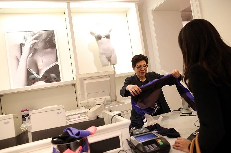 A minimum wage retail employee hard at work