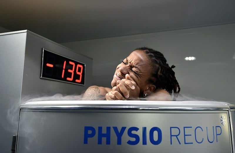 A woman in a cryotherapy tank