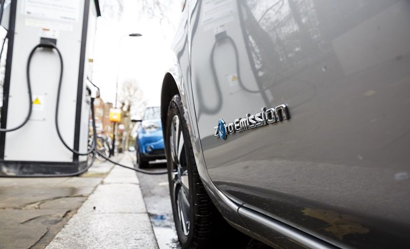 Go Ultra Low Nissan LEAF on charge on a London street. Ultra-low emission vehicles such as this can cost as little as 2p per mile to run and some electric cars and vans have a range of up to 700 miles.