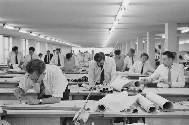Designers, engineers and draughtsmen working on designs