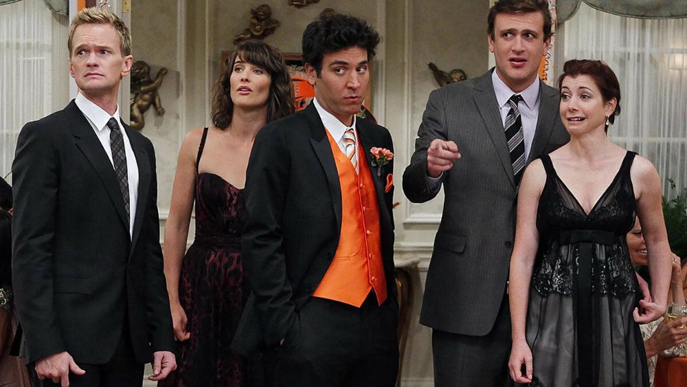 'How I Met Your Mother' friends standing next to each other all dressed up. 'How I Met Your Mother' friends standing next to each other all dressed up.
