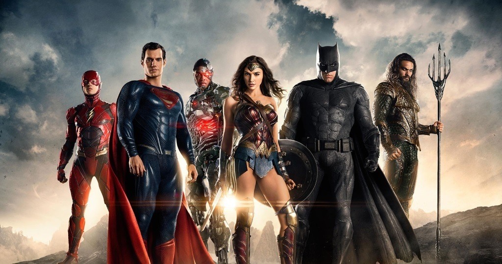 The Justice League superheroes gather together in a posed promo shot