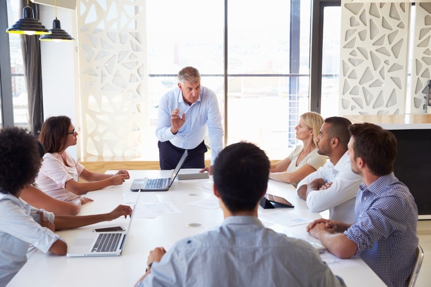 businessman presenting at a meeting