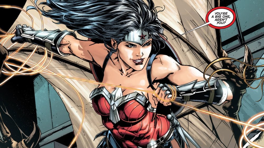 Wonder Woman wielding her golden lasso and smiling