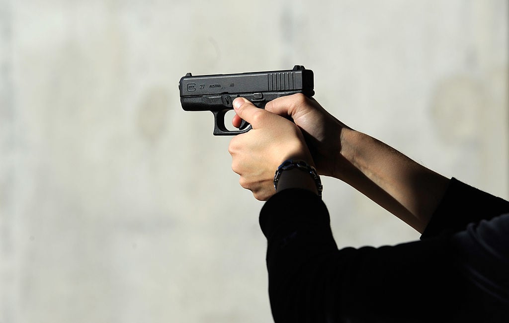 woman with gun