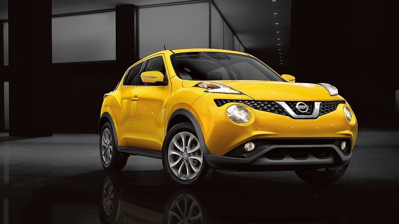 Front- three-quarter view from passenger side of yellow 2016 Nissan Juke