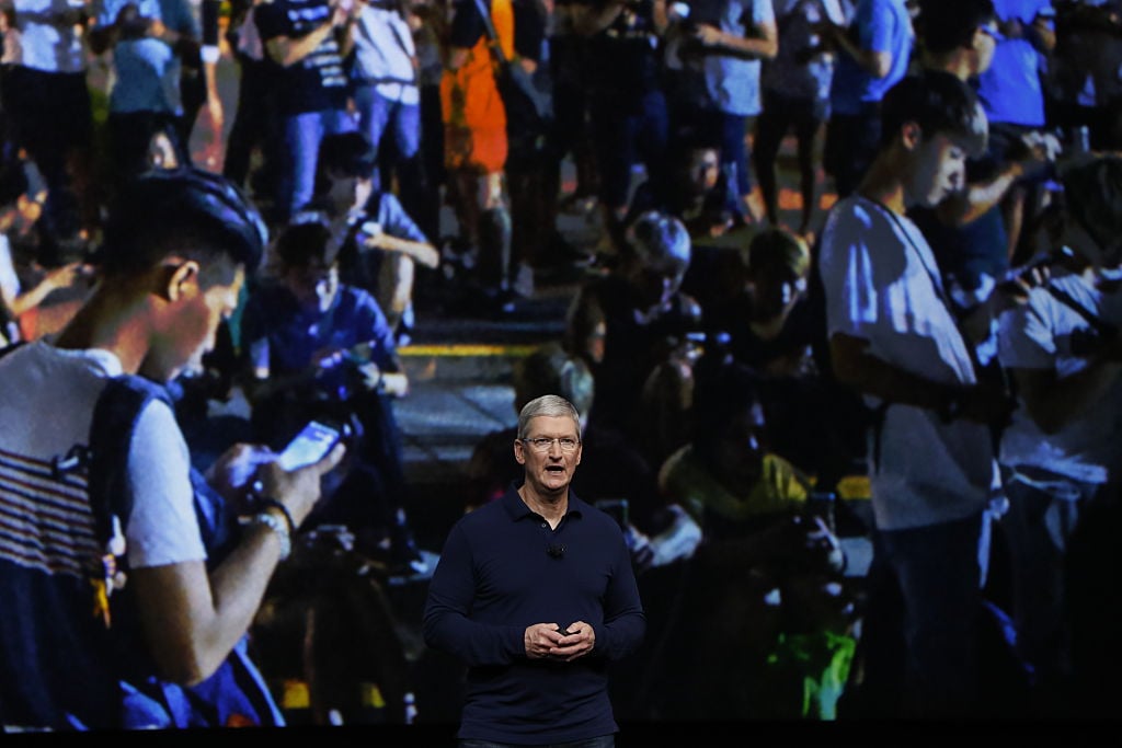 Apple CEO Tim Cook speaks on stage 7 during a launch event