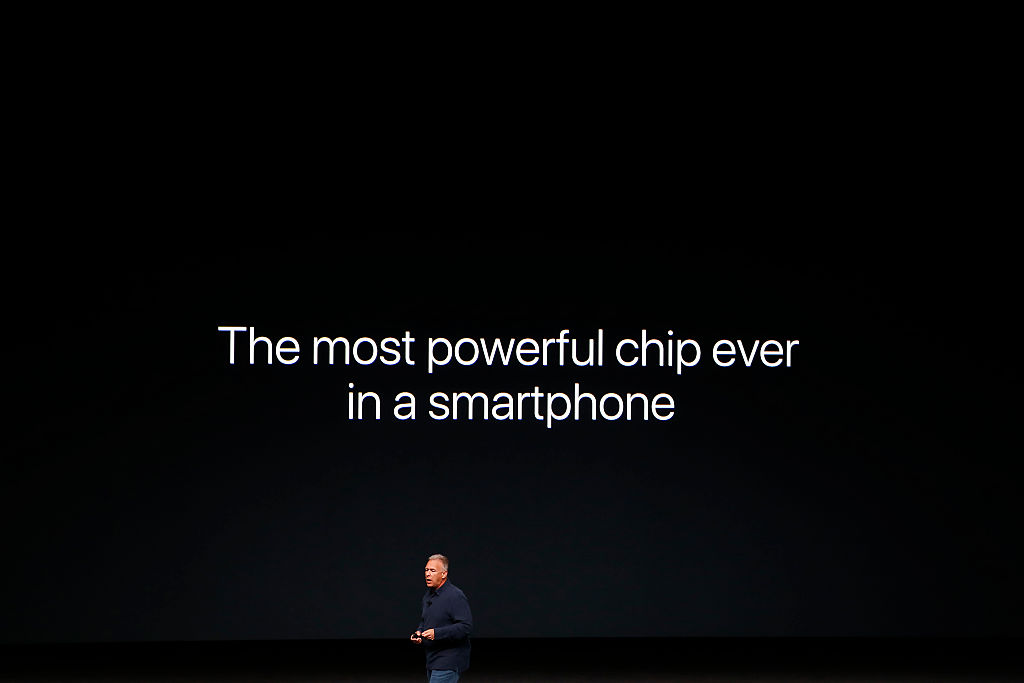 Apple Senior Vice President Phil Schiller speaks on stage during a launch event
