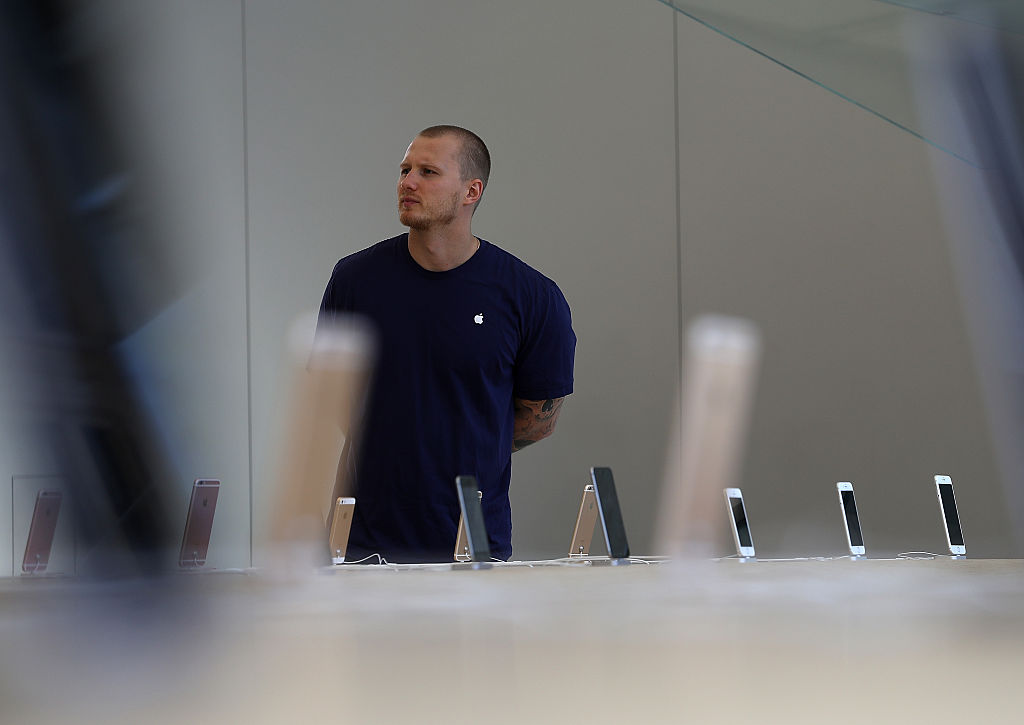 Apple iPhones are displayed during a press preview of the new flagship Apple Store