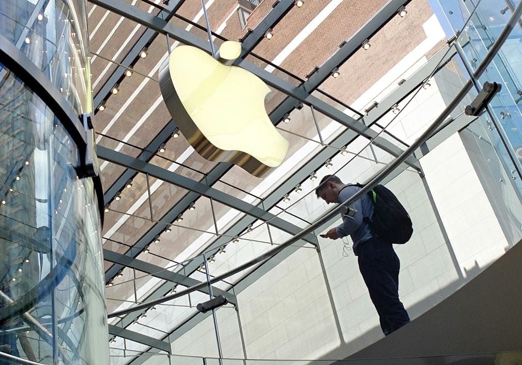 man visits the Apple Store