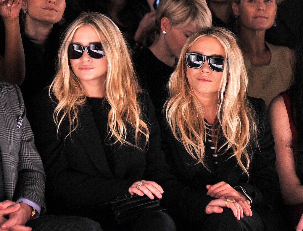 Ashley Olsen and Mary-Kate Olsen attend the J. Mendel Fall 2012 fashion show