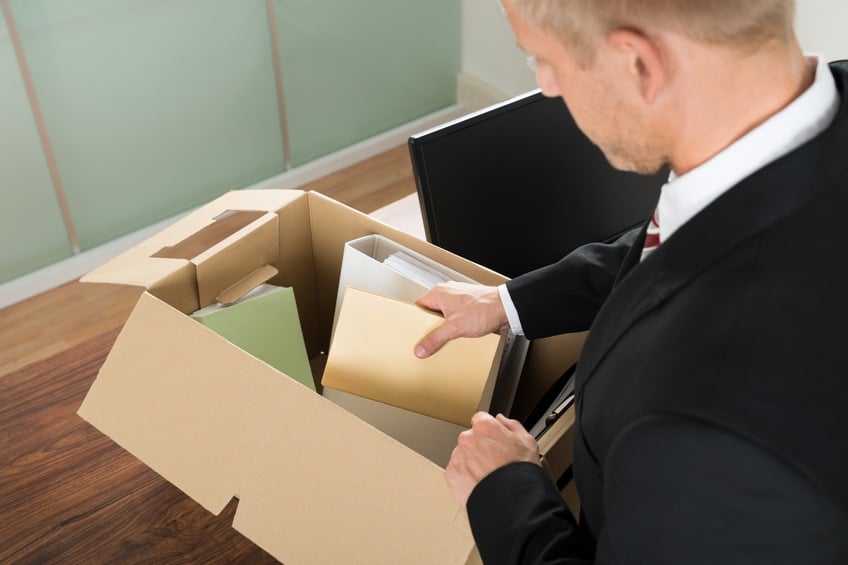 Businessman Packing Files