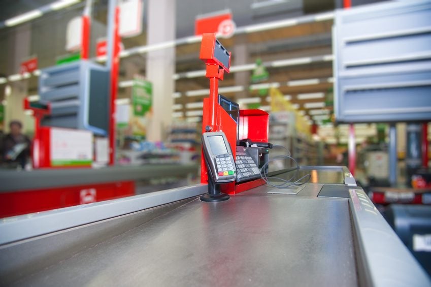 Empty cash desk with payment terminal