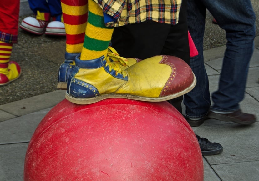 clown wearing outsize