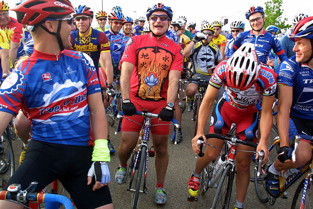 Robin Williams at a charity bike ride in red spandex