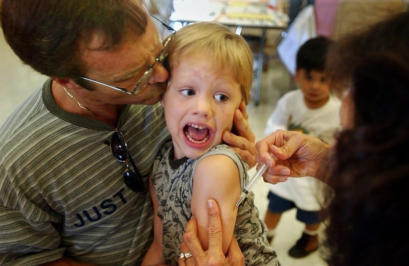 A boy gets a Measles vaccination, stopping a deadly disease in its tracks A boy gets a Measles vaccination, stopping a deadly disease in its tracks