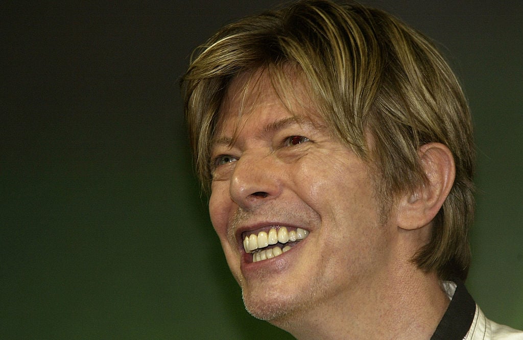 David Bowie smiles as he meets fans