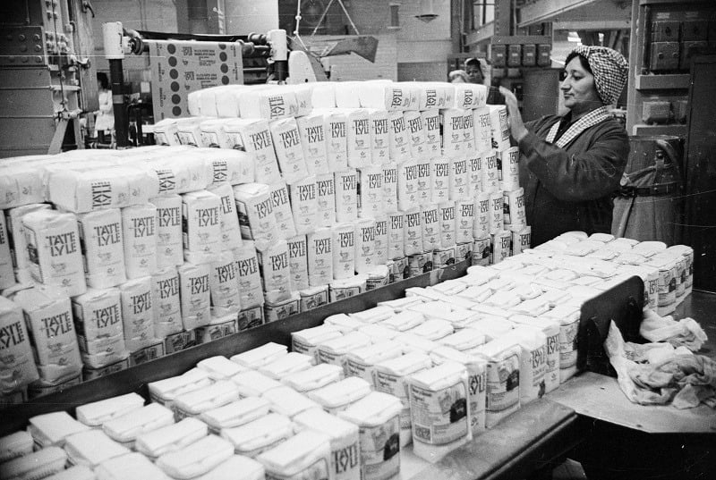 Hundreds of bags of sugar in a warehouse