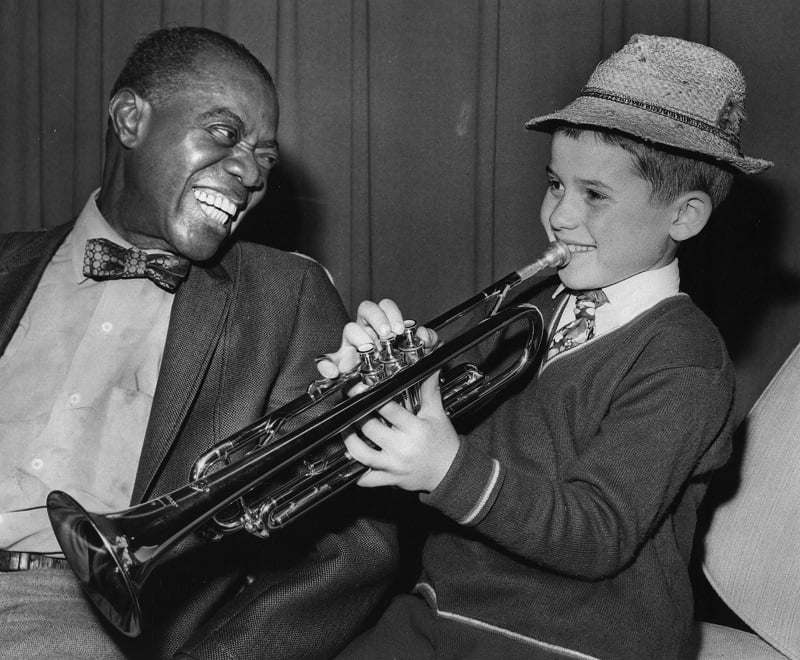 Jazz legend 'Satchmo' instructs a young fan
