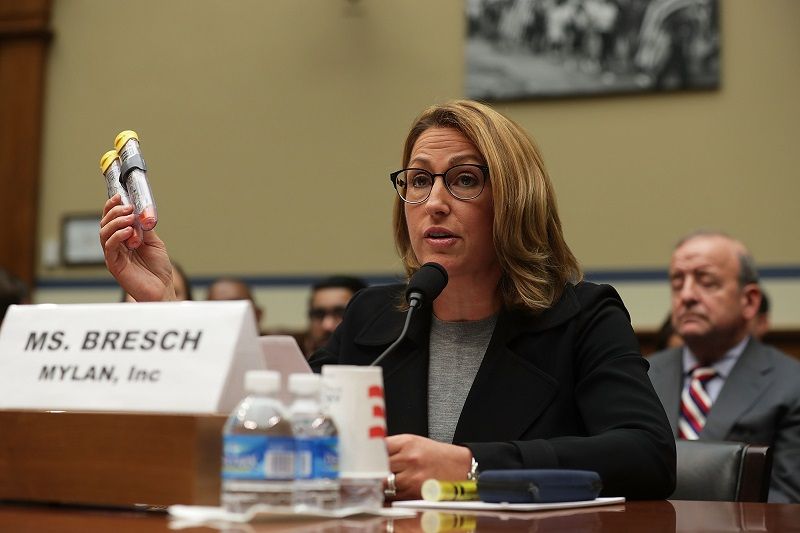 Mylan Inc. CEO Heather Bresch holds up a 2-pack of EpiPen as she testifies during a hearing before the House Oversight and Government Reform Committee
