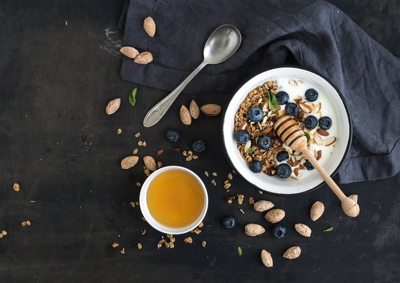 Oat granola with fresh blueberries, almond, yogurt