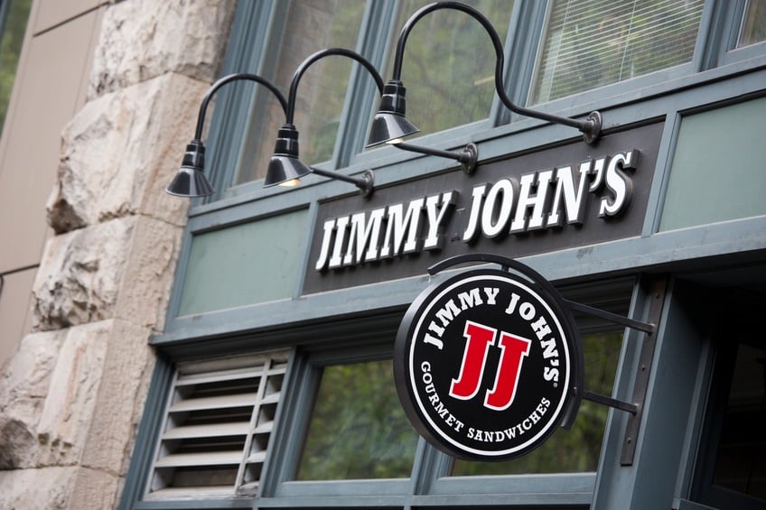 The logo and sign of a Jimmy John's Gourmet Sandwich Shop