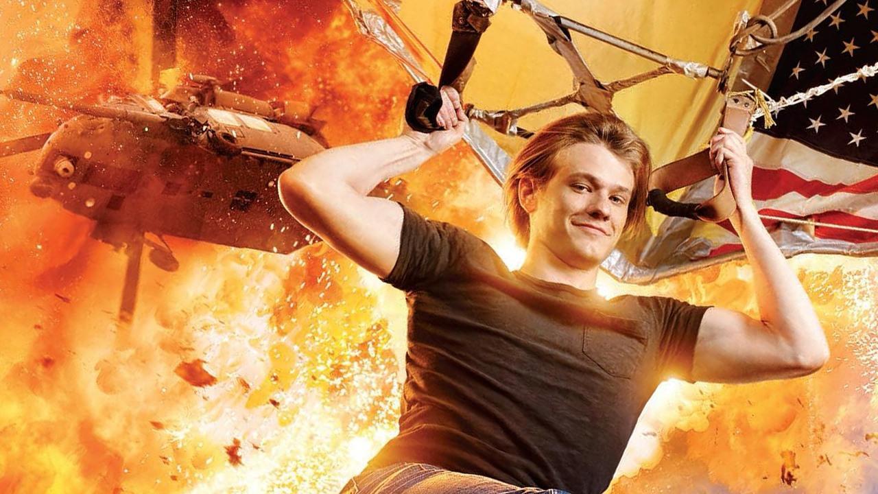 Lucas Till's Macgyver hangs from an airplane