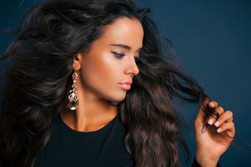 brunette woman with beauty long curly hair