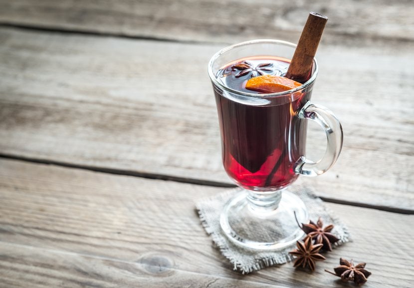 Mulled wine on wooden background