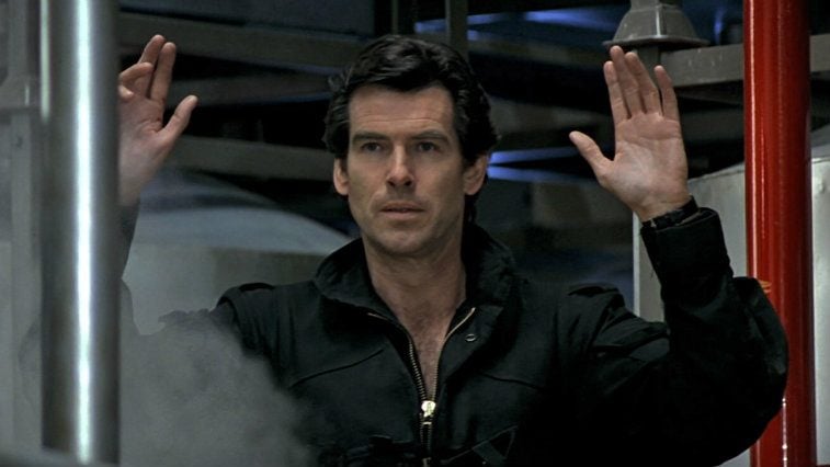 Pierce Brosnan holds up his hands in Goldeneye