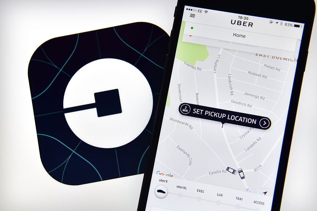 The Uber home page is displayed on an iPhone