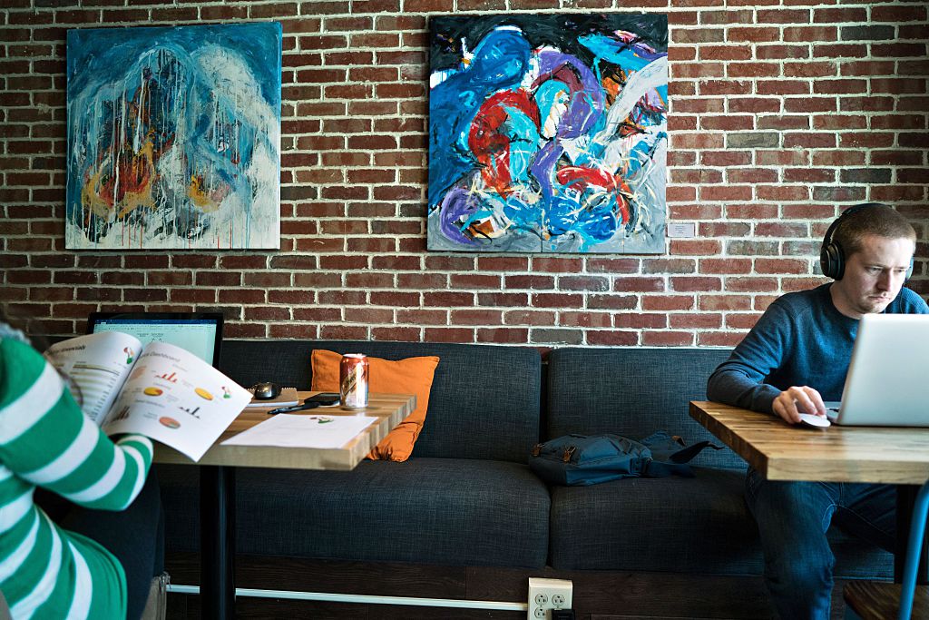 People work at the "coworking" space Cove