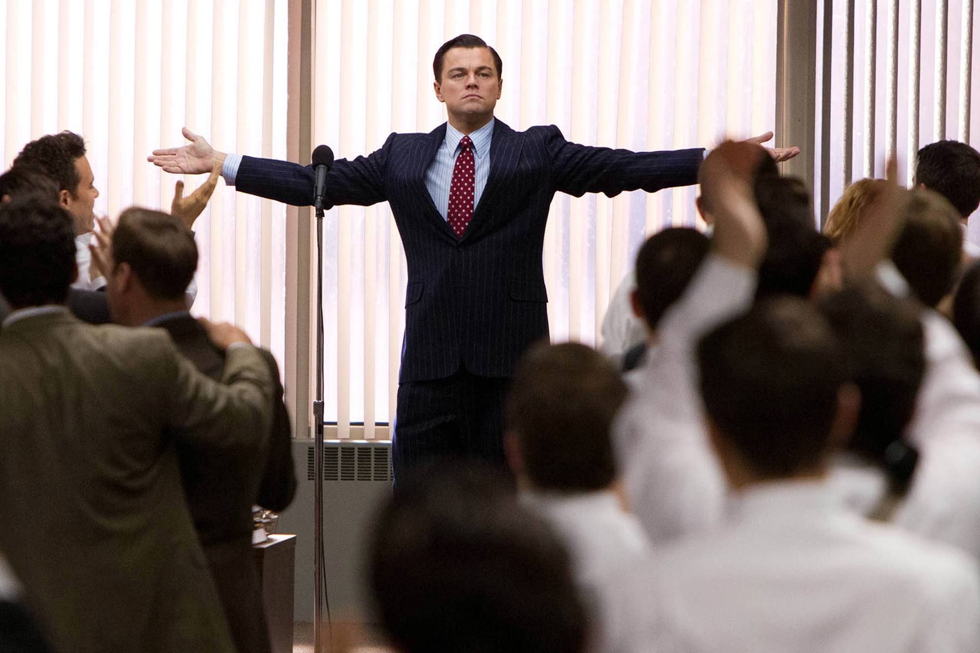 A still from 'The Wolf of Wall Street' shows loyalty and praise to the film's antihero, Jordan Belfort