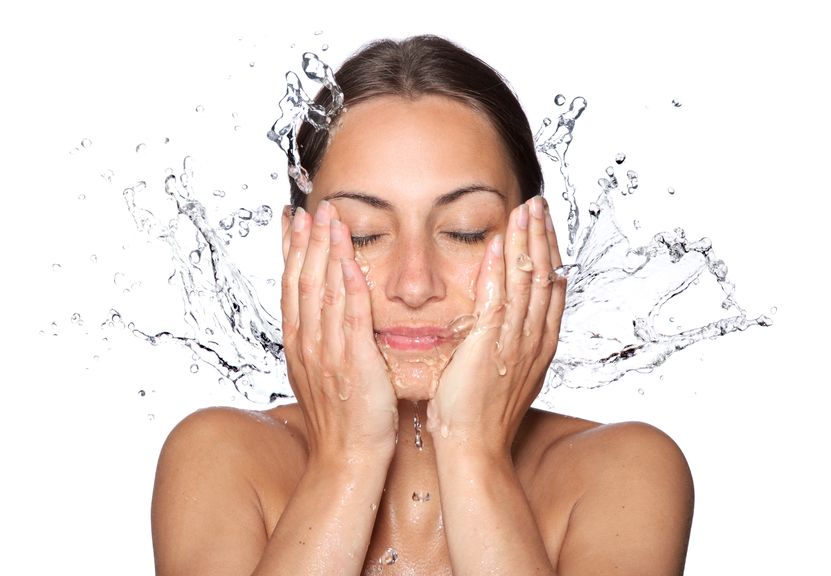 wet woman face with water drop
