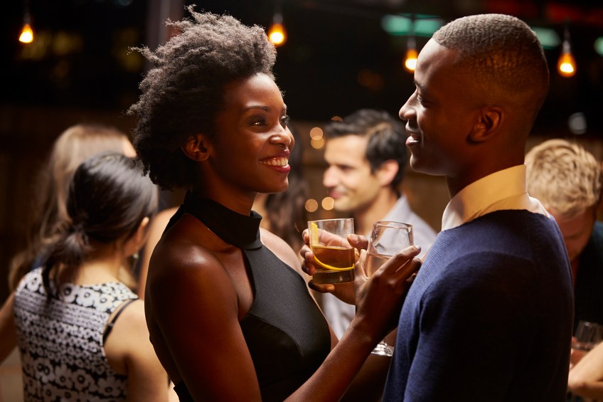 Couples Dancing And Drinking