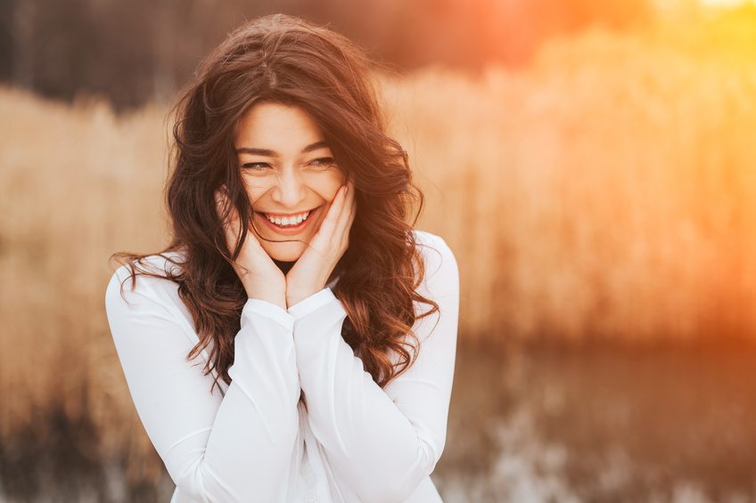 beautiful smile hides her blushing