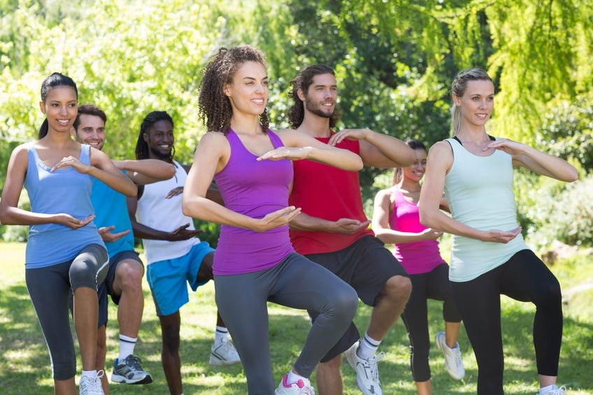 Fitness group doing tai chi